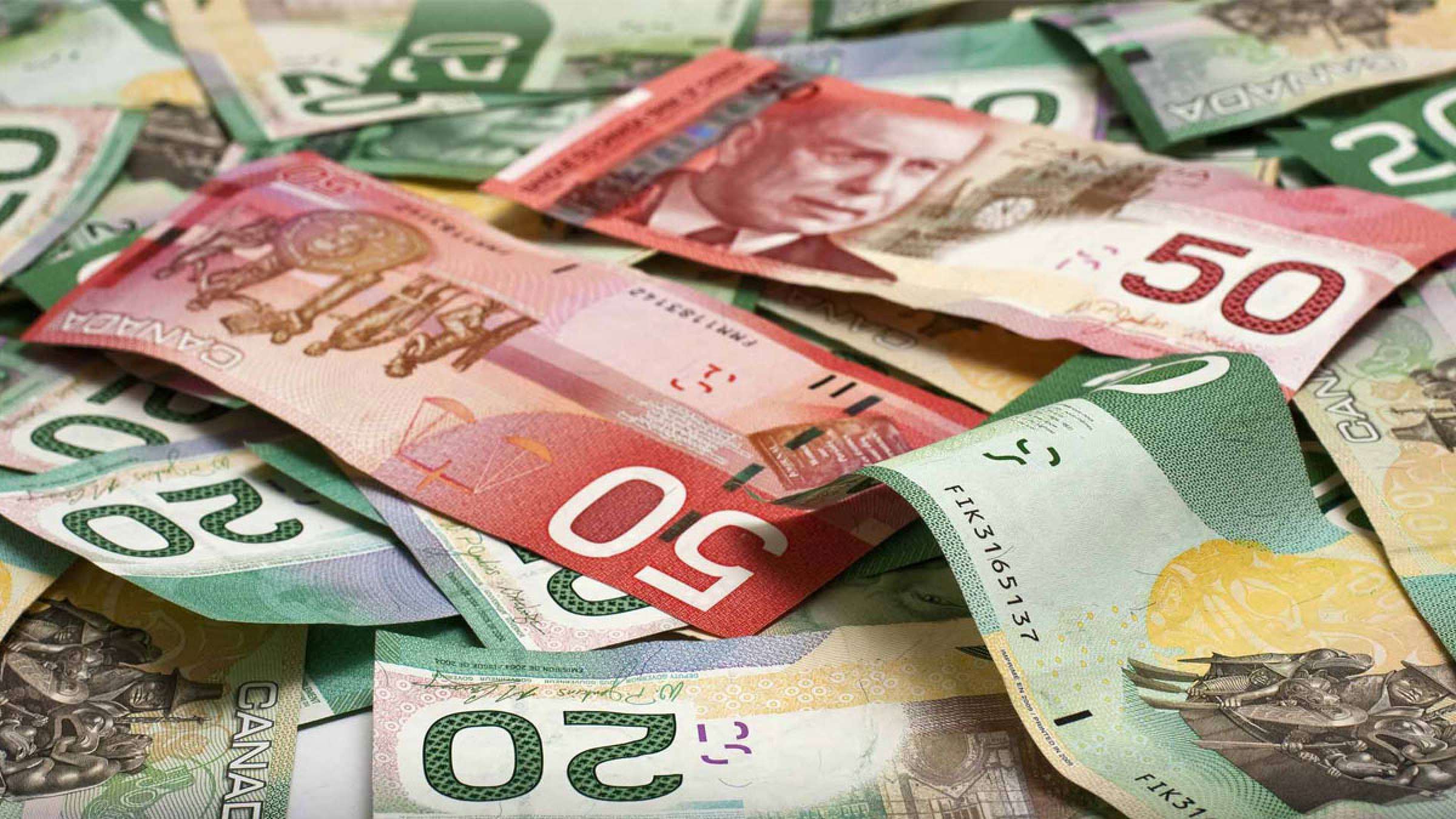 خبر-کانادا-هم-کارکنان-آژانس-مسکن-کانادا-کارمندان-بانک-مرکزی-سال-گذشته-۲۷-میلیون-دلار-پاداش