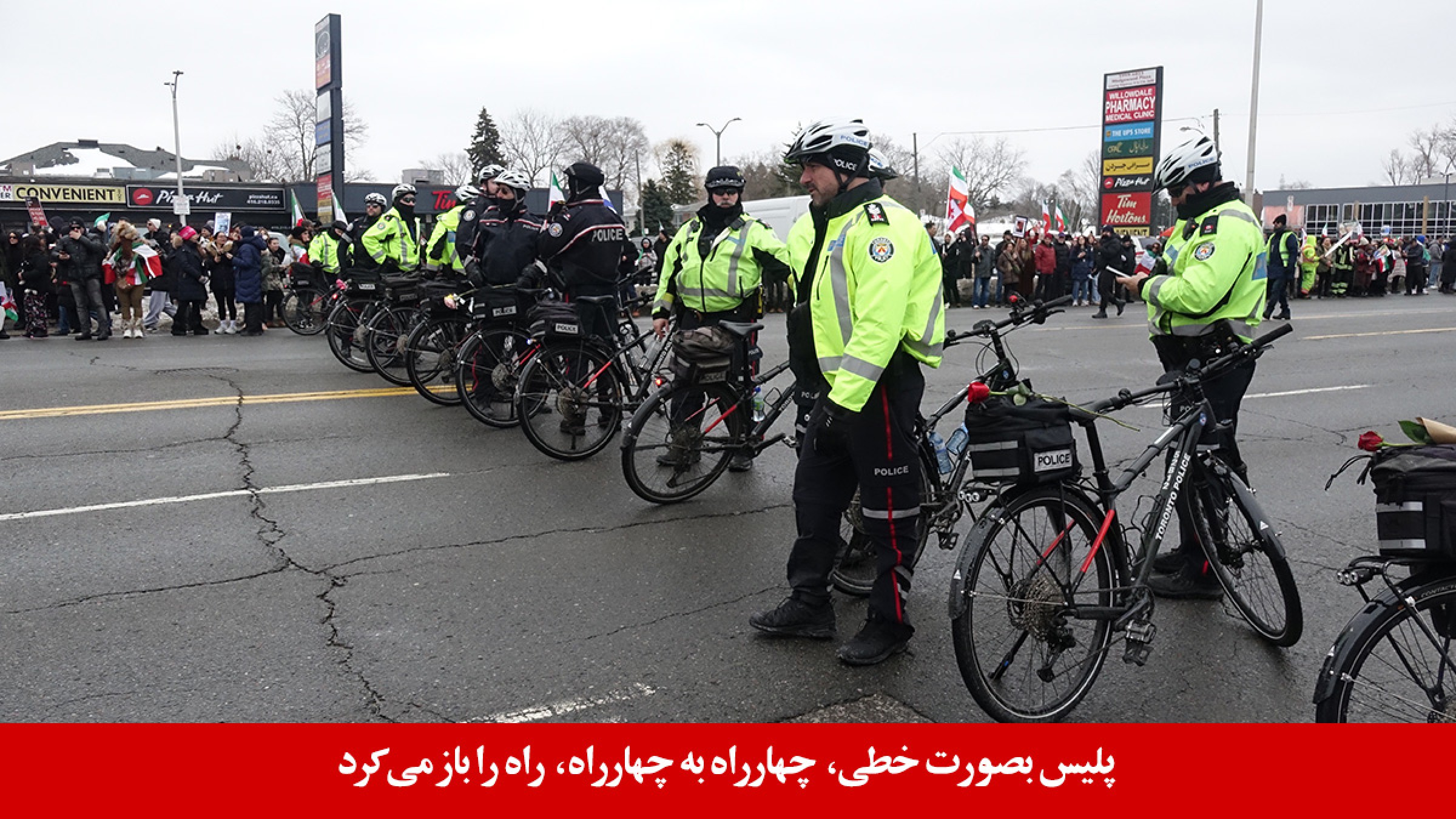 cops-Iranian-rally-Toronto-14-Feb-Yonge-St cops-Iranian-rally-Toronto-14-Feb-Yonge-St